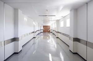 Long white hospital corridor.
