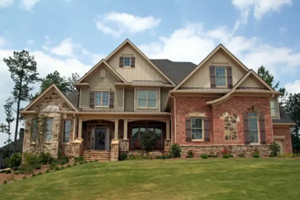 Luxury home with a lush green lawn - keep pests away from your home with Arrow Exterminating in NY