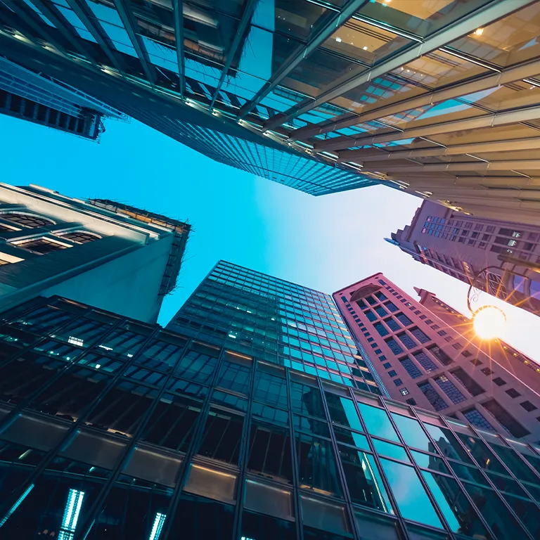 View of New York City skyscrapers from ground level, home of Arrow Exterminating.