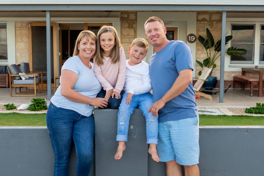 a happy family with no termites in their home